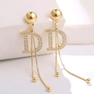 Dangle earrings gold D
